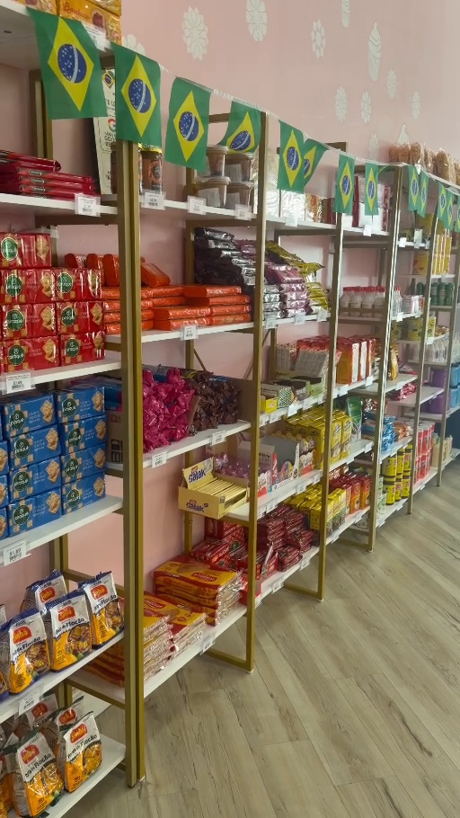 Inside Bem Brazil Market with shelves of Brazilian products