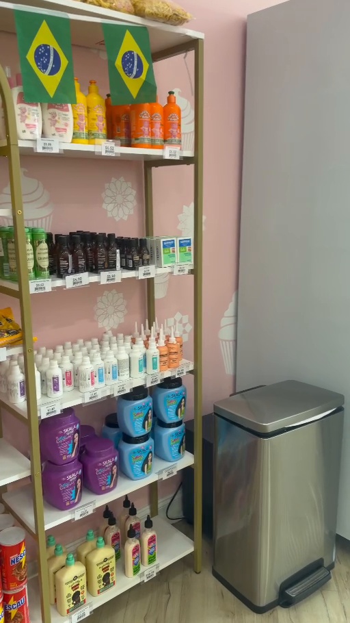 Shelf with products and Brazilian flags inside the store